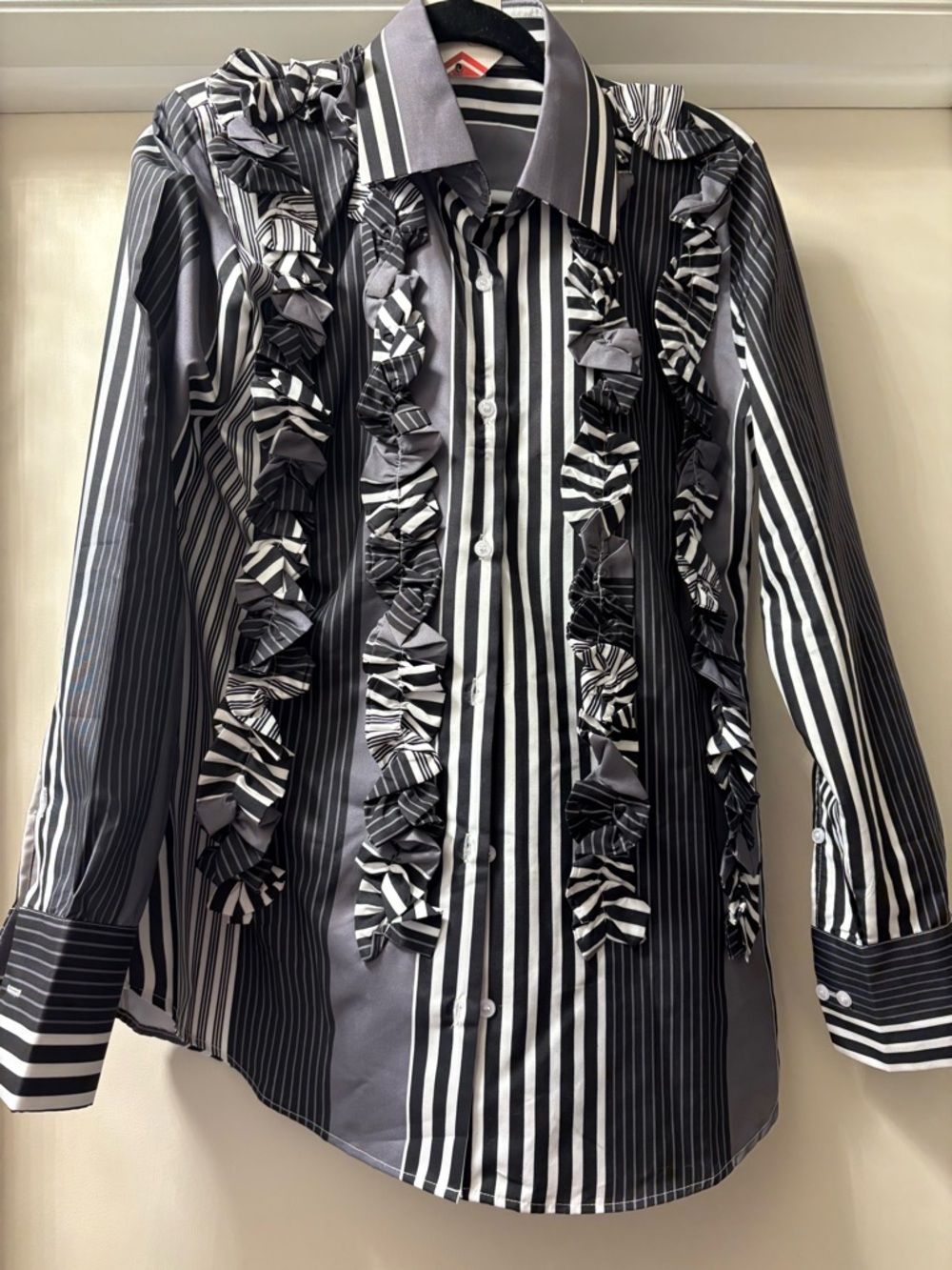 Women's Black & White Striped Ruffle Button-Front Blouse. Seen on Emily in Paris